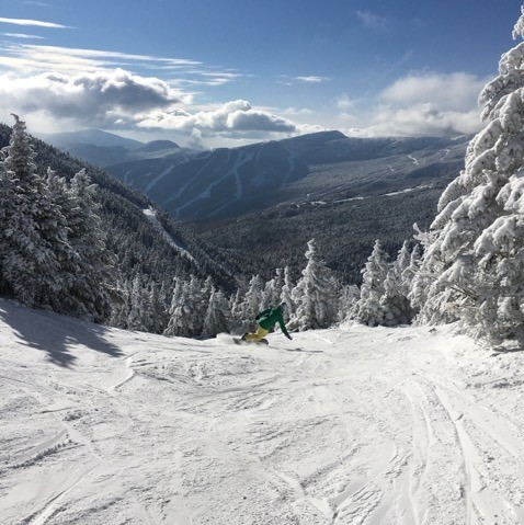 A person skiing down a mountain
